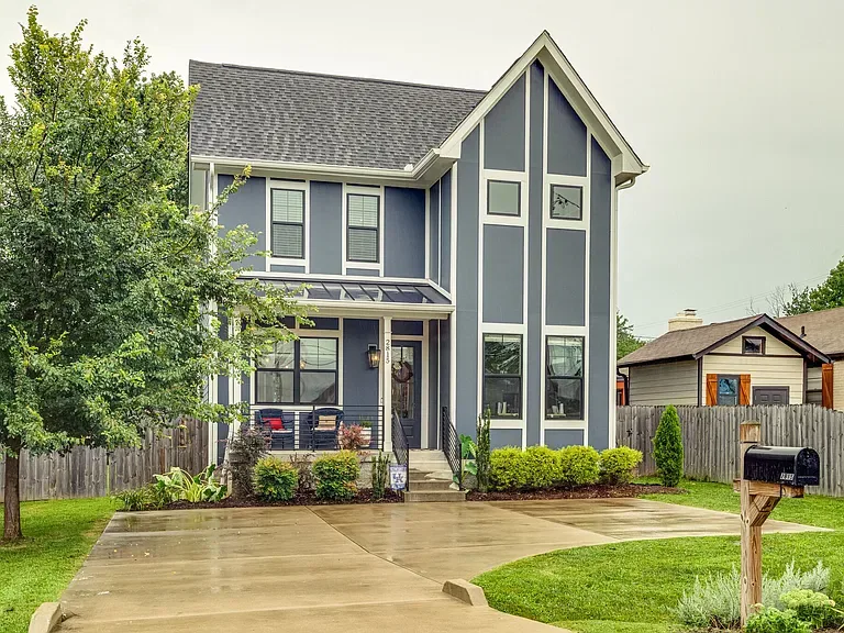 Board-and-batten front elevation with covered porch